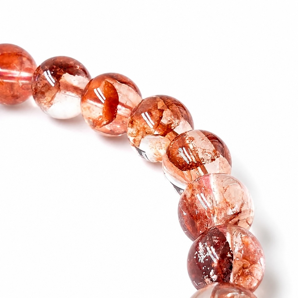 6 to 7mm fire quartz beads with red inclusions on elastic cord