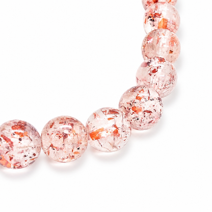 Detail of strawberry-red lepidocrocite clouds in quartz