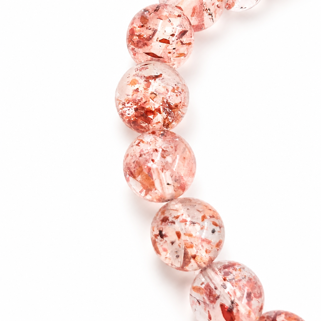 Strawberry Super 7 crystal bracelet curved on a white background