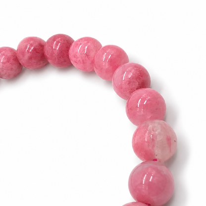 Deep saturated rose rhodonite beads at the rich end of the ombré gradient bracelet