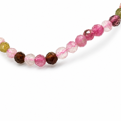 Faceted rainbow tourmaline bracelet on a white background