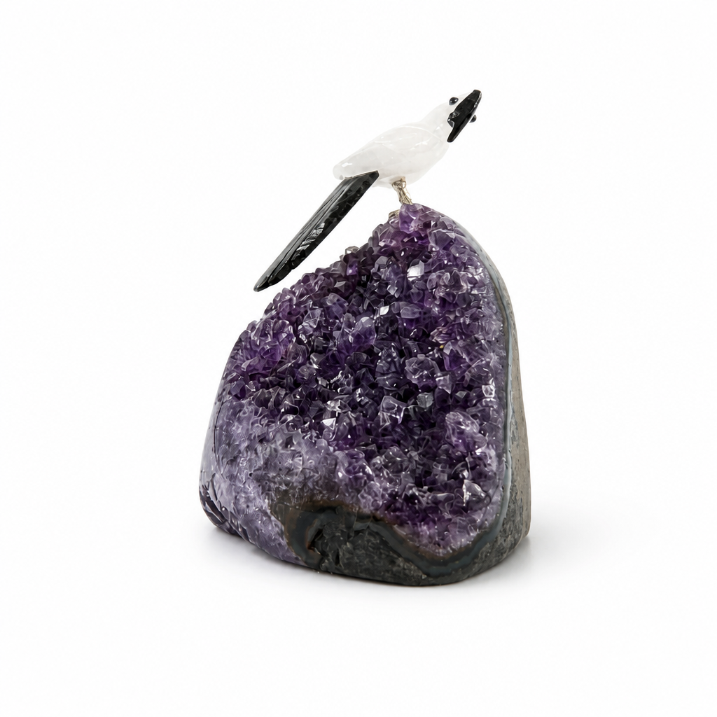 Amethyst Parrot Specimen with carved crystal parrot on a violet amethyst cluster base