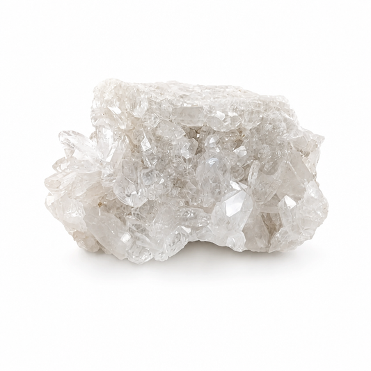 Clear Quartz cluster specimen with water-clear prismatic points on a white surface