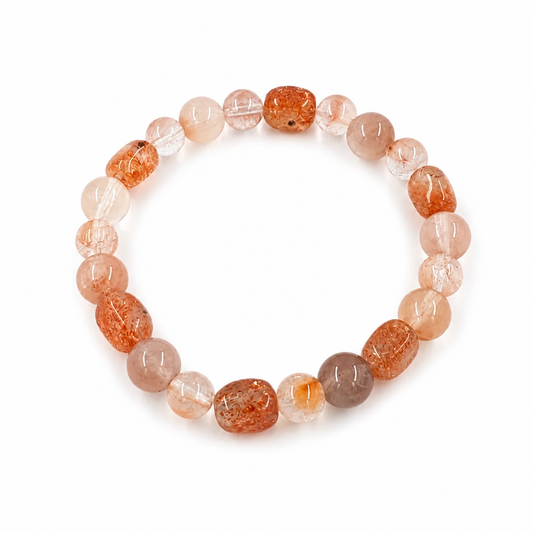 Close-up of natural aventurescence shimmer in deep red-orange sunstone beads