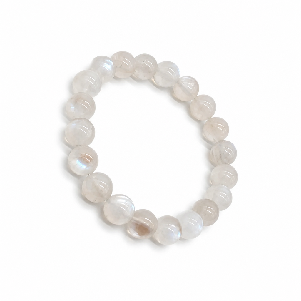 Close-up of glassy Ceylon moonstone beads with blue adularescence