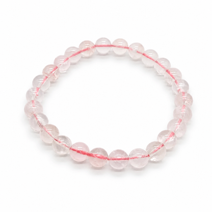 Full bracelet circle of Madagascar Ice Rose Quartz showing jelly-like bead transparency