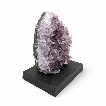 Full front view of the Violet Peak Amethyst spire on a dark wooden display base