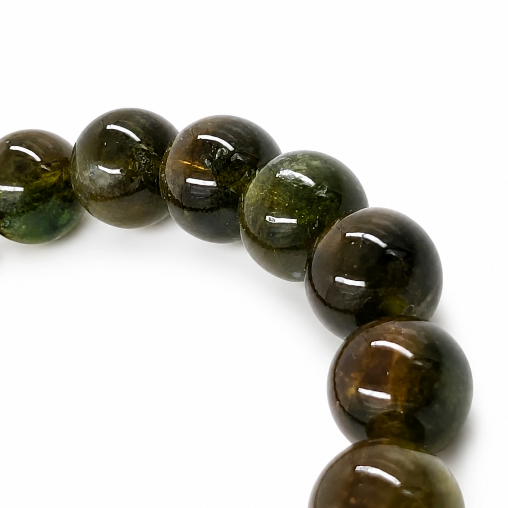 Detail of natural iron and chromium colour depth in verdelite tourmaline beads