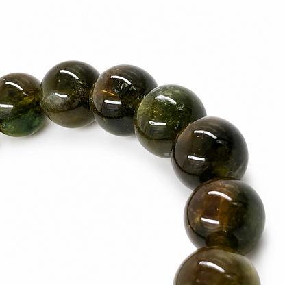 Detail of natural iron and chromium colour depth in verdelite tourmaline beads