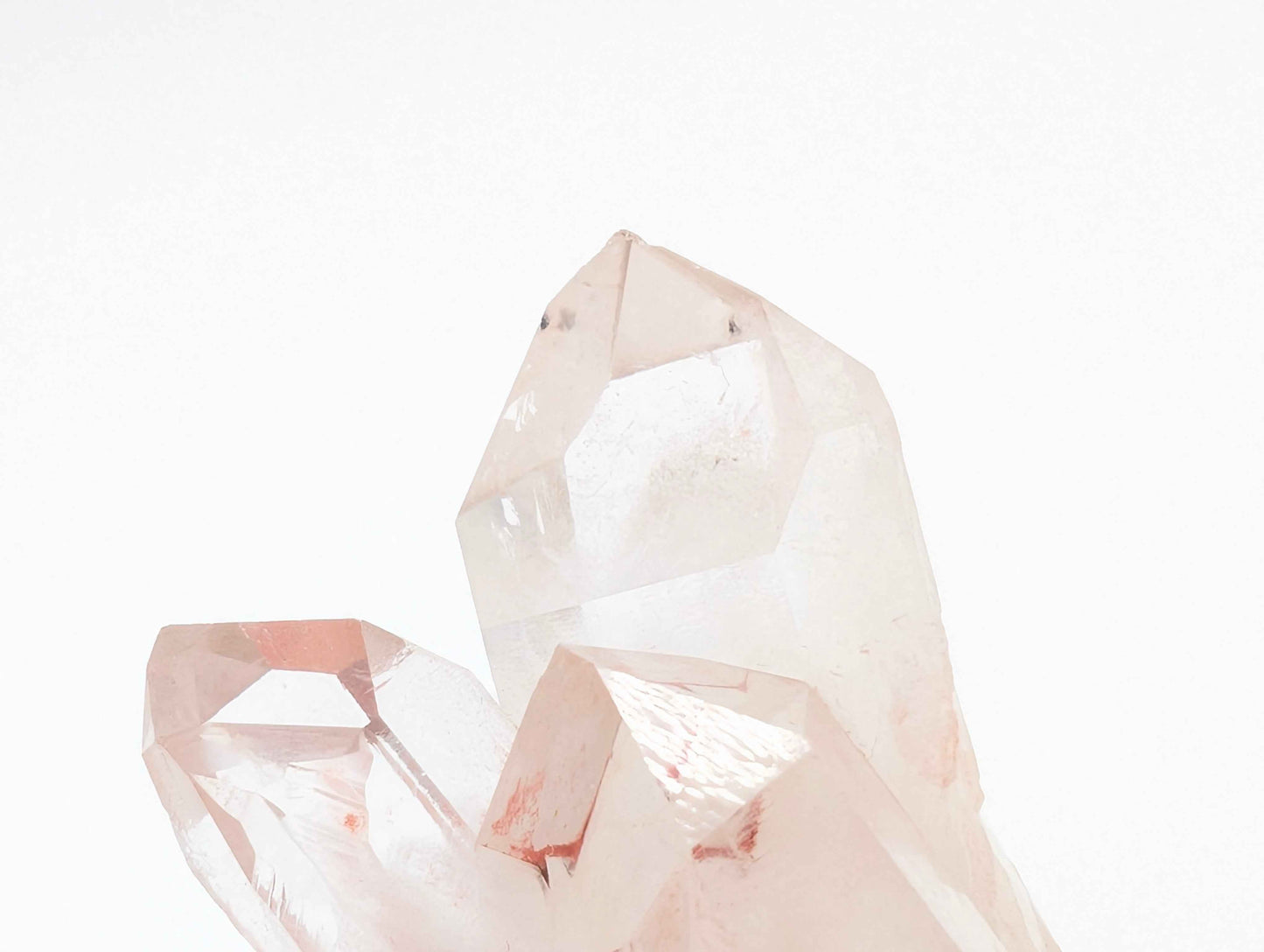 Himalayan Pink Samadhi Quartz cluster on a shelf for home decor display