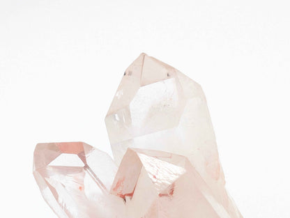 Himalayan Pink Samadhi Quartz cluster on a shelf for home decor display