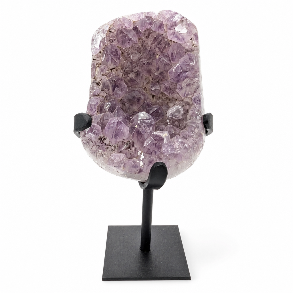 Close-up of deep violet phantom formations inside plump druzy amethyst points