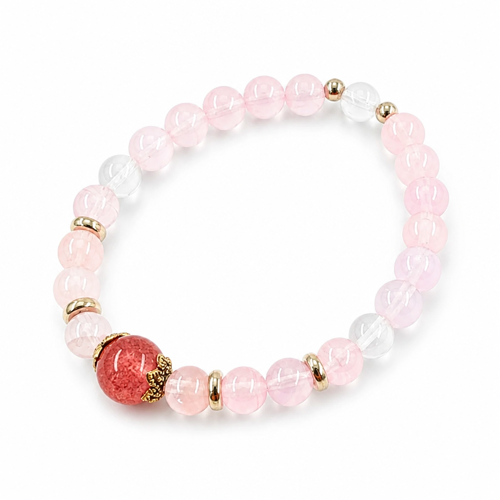 Strawberry Quartz focal bead with hematite flame inclusions, close-up