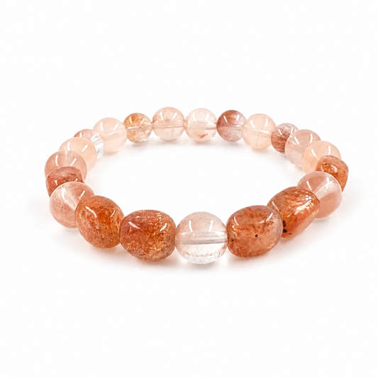 Close-up of natural aventurescence shimmer in warm amber sunstone beads