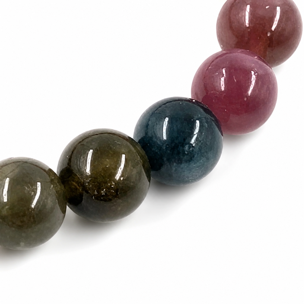 Deep indigo and teal tourmaline beads in the full-spectrum bracelet