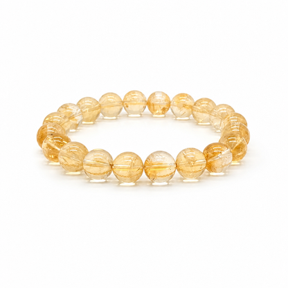 Close-up of genuine natural citrine beads with smoky gradation