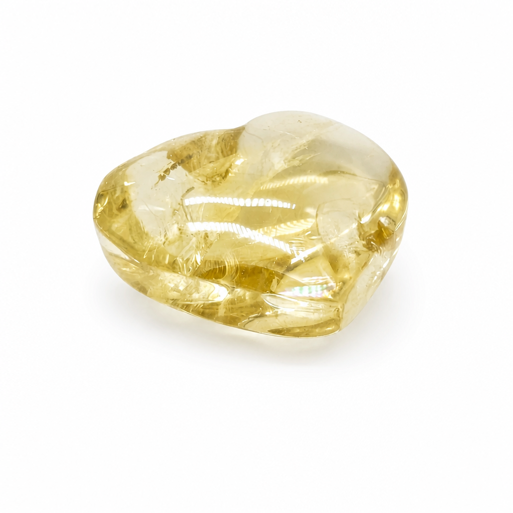 Compact natural citrine heart held to the light showing vivid prismatic rainbow veils