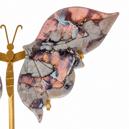 Deep sapphire-indigo tones of the carved flower agate butterfly
