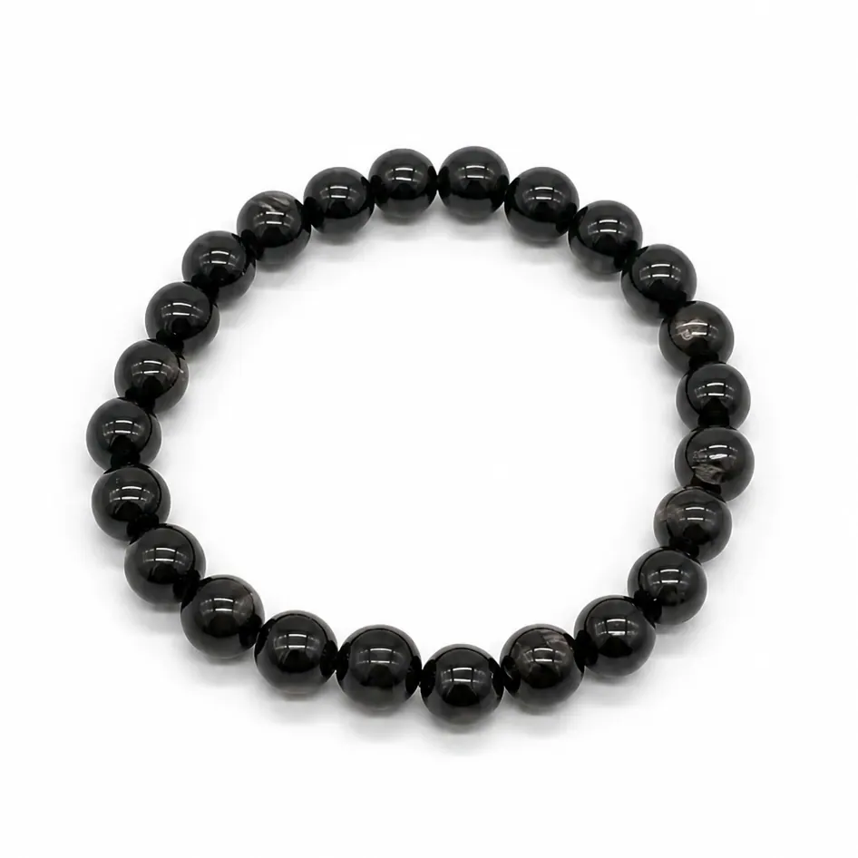 Hypersthene bracelet worn on the wrist in soft daylight