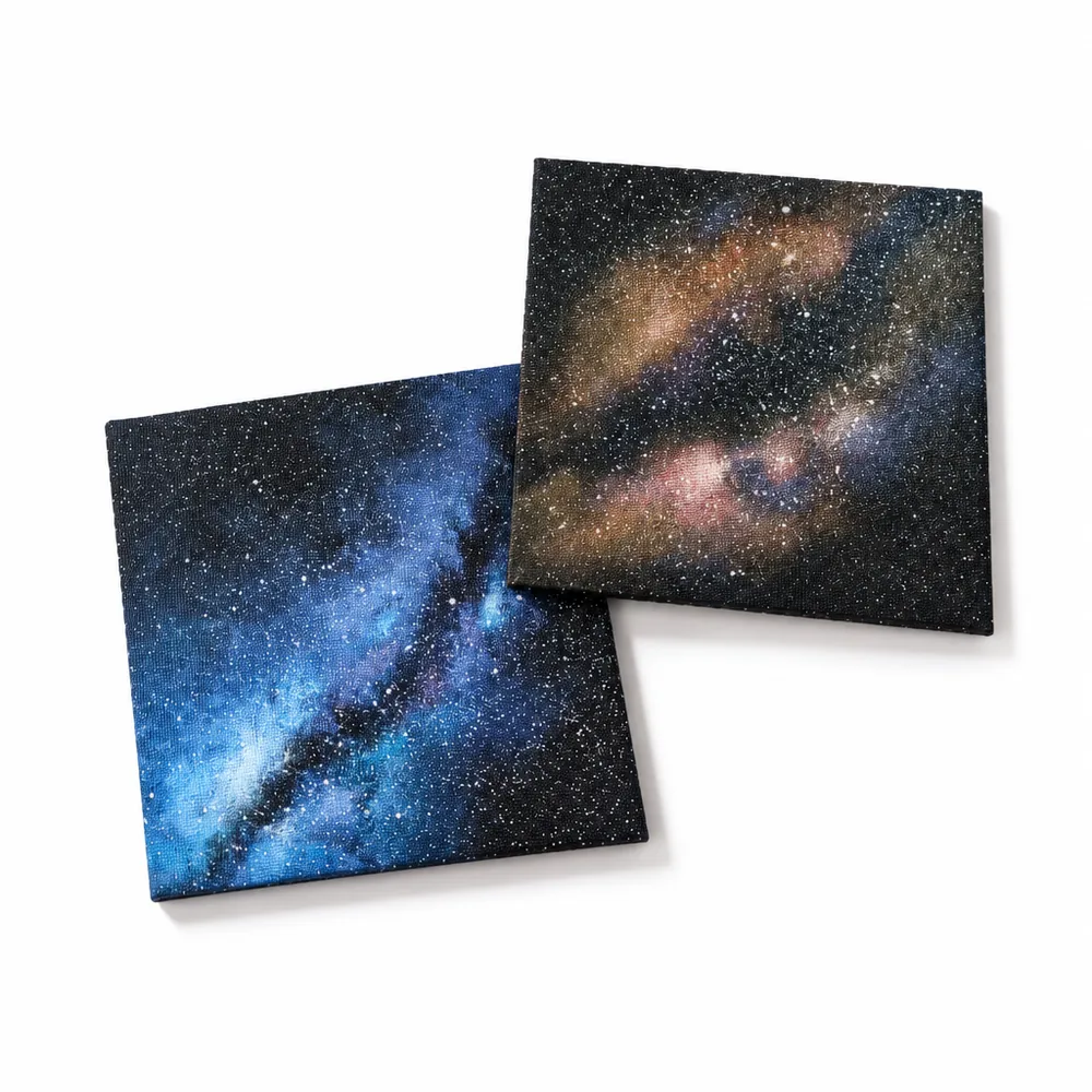 Blue and amber Milky Way canvases resting side by side