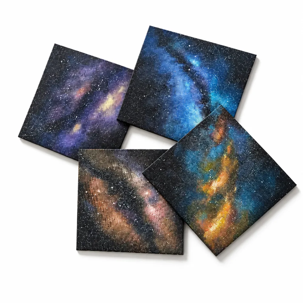 Four hand-painted Milky Way pet memorial canvases in violet, blue, amber and gold — AuraLune Crystal
